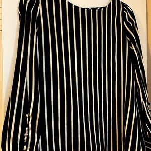 used a few times.  medium size.  express. Color black and silver